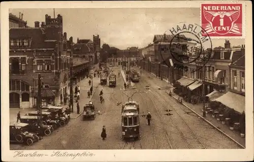 Ak Haarlem Nordholland Niederlande, Stationsplein, Straßenbahn, Autos