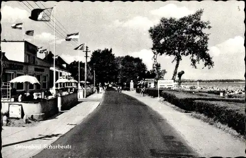 Ak Ostseebad Scharbeutz in Holstein, Promenade, Terrasse, Strand, Fahnen
