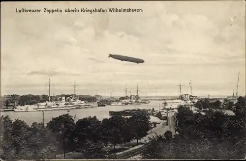 Ak Wilhelmshaven an der Nordsee, Lufkreuzer Zeppelin über dem Kriegshafen