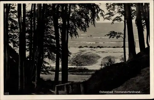 Ak Timmendorfer Strand, Blick auf Strand durch Bäume, Wellen