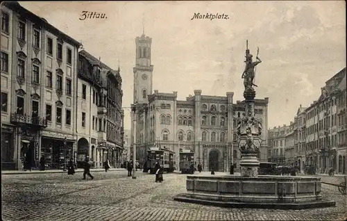 Ak Zittau in der Oberlausitz, Marktplatz, Rathaus, Brunnen, Straßenbahnen, Geschäft Gustav Renger