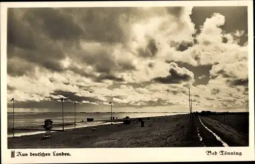 Ak Tönning an der Eider Nordfriesland, Deich, Wolken