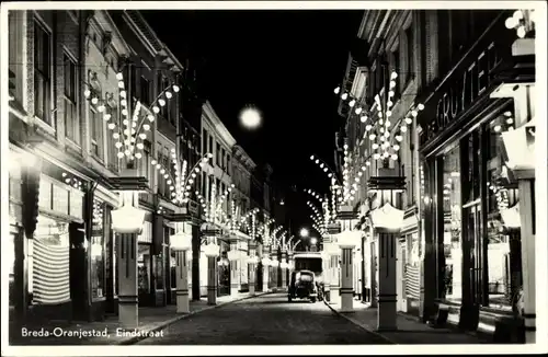 Ak Breda Nordbrabant Niederlande, Oranjestad, Eindstraat, Geschäfte, Straßenbeleuchtung