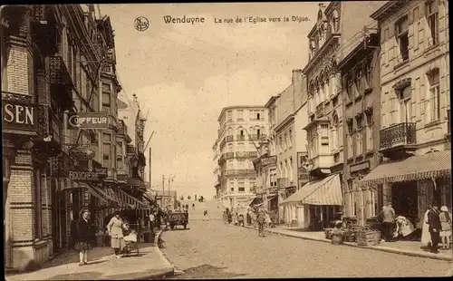 Ak Wenduine Wenduyne De Haan Westflandern, Rue de l'Eglise in Richtung Digue