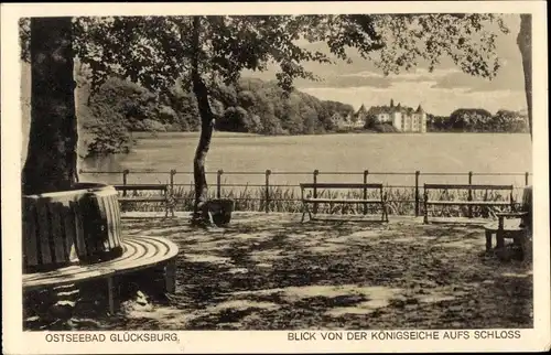 Ak Glücksburg an der Ostsee, Schloss von der Königseiche aus gesehen