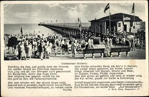 Ak Grömitz in Ostholstein, Passanten auf der Promenade, Anleger