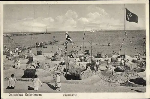 Ak Ostseebad Kellenhusen in Holstein, Strand, Fahnen, Seebrücke