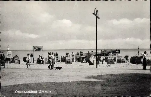 Ak Ostseebad Grömitz in Holstein, Strand, Seebrücke