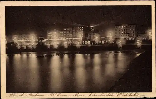 Ak Insel Borkum, Nordseebad, Blick vom Meer auf erleuchtete Wandelhalle