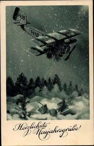 Ak Glückwunsch Neujahr, Flugzeug Nr. 1418, Korb, Kind, Tannenzweige