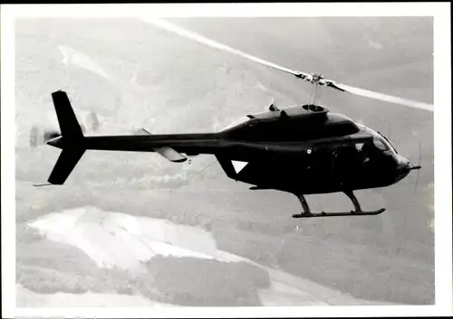 Foto Österreichischer Militär-Hubschrauber in der Luft, Augusta Bell
