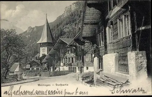 Ak Meiringen Kanton Bern, Straße mit Häusern und Kirche