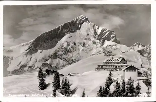 Ak Garmisch Partenkirchen in Oberbayern, Kreuzeckhaus mit Alpspitze, Winter