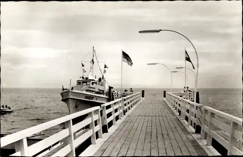 Ak Ostseebad Grömitz in Holstein, Seebrücke, Schiff