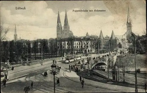 Ak Lübeck, Puppenbrücke mit Holstentor, Straßenbahn