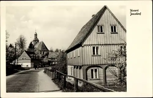 Ak Jonsdorf in der Oberlausitz Sachsen, Straßenpartie, Kirche, Umgebindehaus