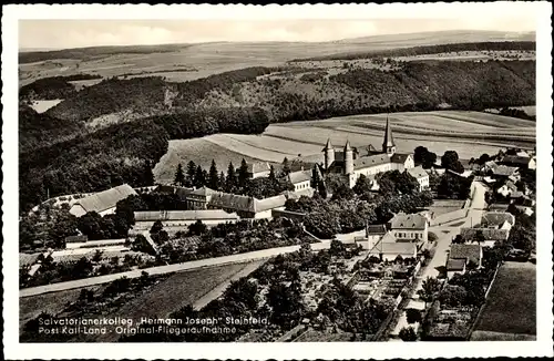 Ak Steinfeld Kall in der Eifel, Fliegeraufnahme vom Salvatorianerkolleg Hermann Joseph