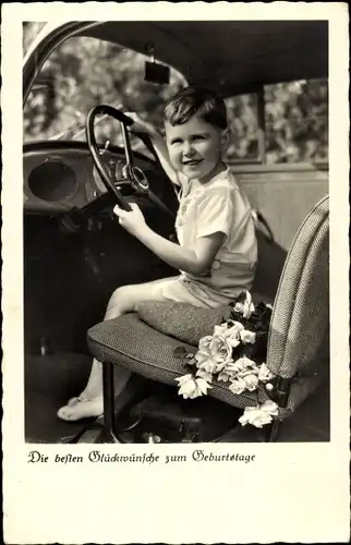 Ak Glückwunsch Geburtstag, Kind am Lenkrad, Blumen