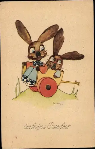 Künstler Ak Glückwunsch Ostern, Zwei Osterhasen, Schubkarre