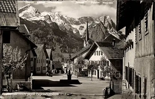 Ak Garmisch Partenkirchen in Oberbayern, Floriansplatz, Zugspitzgruppe, Waxenstein, Alpspitze