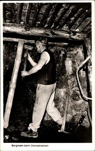 Ak Bergmann beim Stempelsetzen