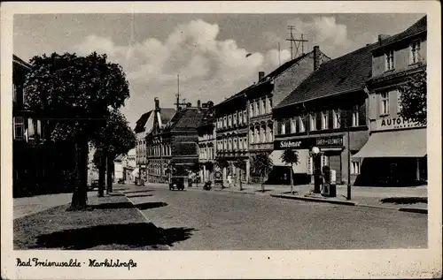 Ak Bad Freienwalde an der Oder, Blick in die Marktstraße, Geschäftsgebäude, Tankstelle, Shell