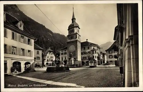 Ak Altdorf Kt. Uri Schweiz, Dorfplatz mit Telldenkmal