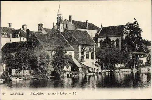 Ak Nemours Seine-et-Marne, Das Waisenhaus, gesehen auf dem Loing