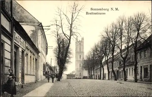 Ak Słońsk Sonnenburg Neumark Ostbrandenburg, Breitestraße, Turm, Geschäft Emil Gr...