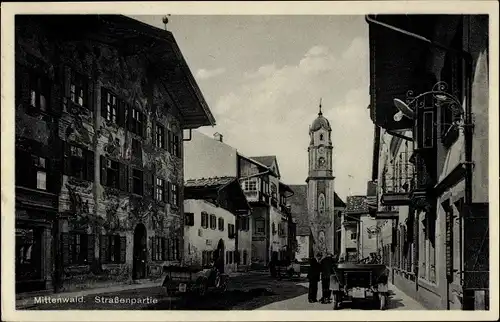 Ak Mittenwald in Oberbayern, Straßenpartie, Kirche