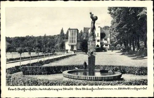 Ak Bad Rothenfelde im Teutoburger Wald, Märchenbrunnen mit Wittekindsprudel