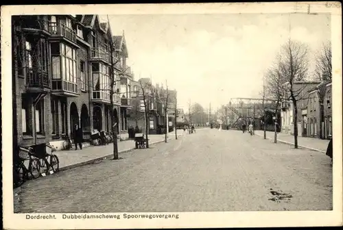 Ak Dordrecht Südholland Niederlande, Dubbeldamscheweg Bahnübergang