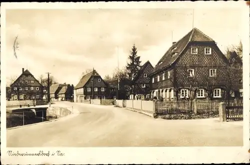 Ak Niedercunnersdorf Kottmar in der Oberlausitz Sachsen, Dorfstraße, Umgebindehäuser