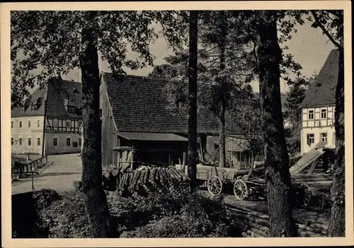 Ak Höckendorf Klingenberg im Osterzgebirge, Dorfbild am Gasthof, Holzstapel