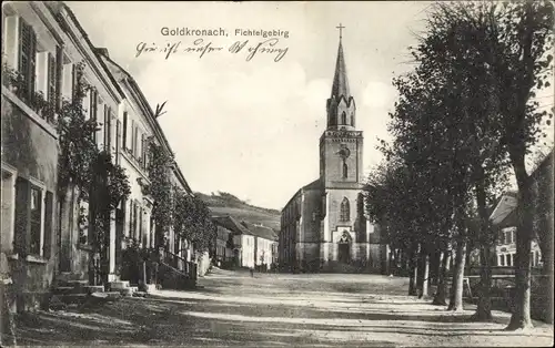 Ak Goldkronach im Fichtelgebirge, Straßenpartie mit Kirche