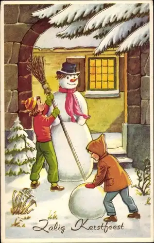 Ak Frohe Weihnachten, Kinder bauen einen Schneemann