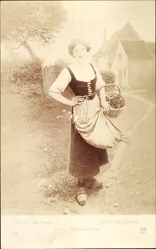 Künstler Ak Frau mit Kirschen in einem Korb