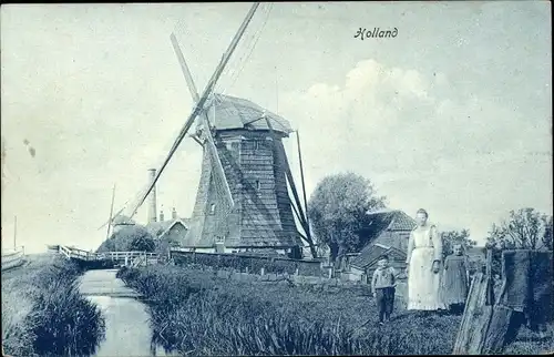 Ak Niederlande, Windmühle, Frau mit Kindern, Flusspartie