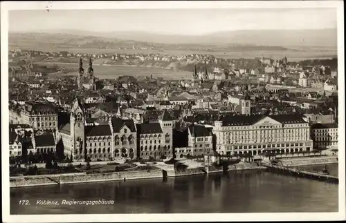 Ak Koblenz am Rhein, Regierungsgebäude, Luftbild der Stadt