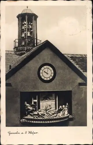 Ak Hameln in Niedersachsen, Rattenfänger Kunstuhr mit Glockenspiel am Rathaus, Auszug der Kinder