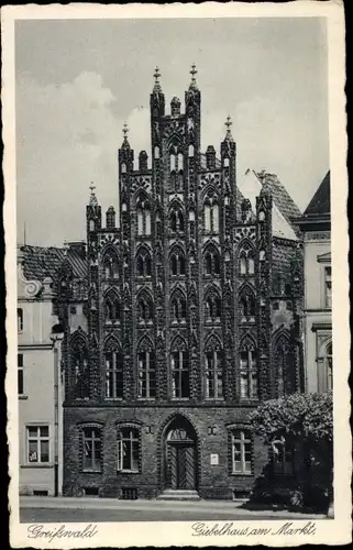 Ak Greifswald, Giebelhaus am Markt