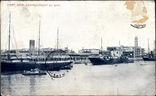 Ak Port Said Ägypten, Debarquement au Quai, Hafenpartie, Dampfschiffe, Häuser