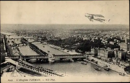 Ak Paris, L'Aeroplane Farman, Doppeldecker über der Stadt