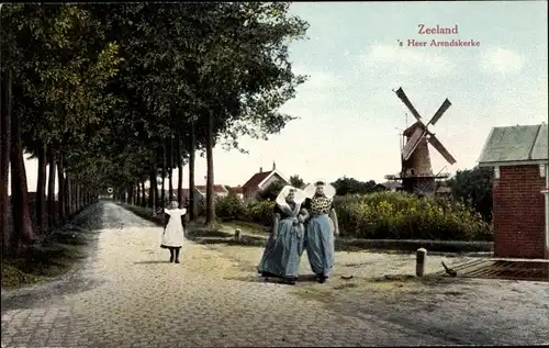 Ak's Heer Arendskerke Zeeland Niederlande, Allee, Windmühle, Frauen in Volkstracht