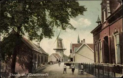 Ak IJsselmonde Rotterdam Südholland Niederlande, Straßenpartie, Windmühle