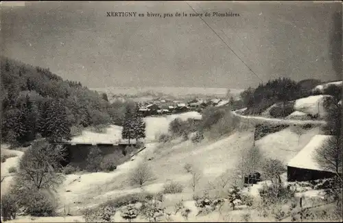 Ak Xertigny Vosges, aufgenommen von der Route de Plombieres, Winter