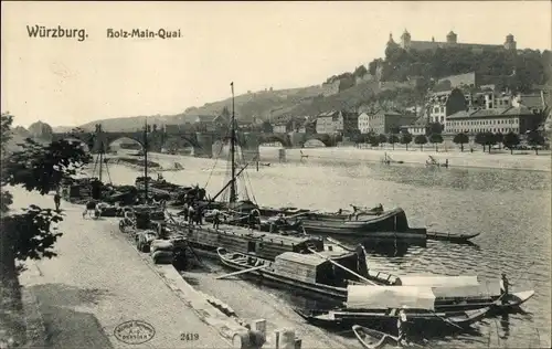 Ak Würzburg am Main Unterfranken, Partie am Holz Main Quai, Frachter, Brücke