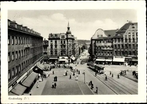Ak Zabrze Hindenburg Schlesien, Platz, Geschäftshäuser, Straßenbahn