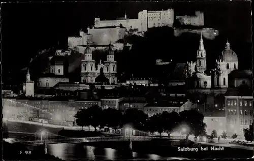 Ak Salzburg in Österreich, Festung Hohensalzburg, Nachtansicht, Brücke