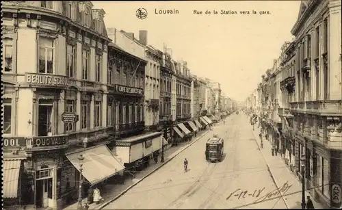 Ak Louvain Leuven Flämisch Brabant, Rue de la Station, Straßenbahn, Quo Vadis, Berlitz School